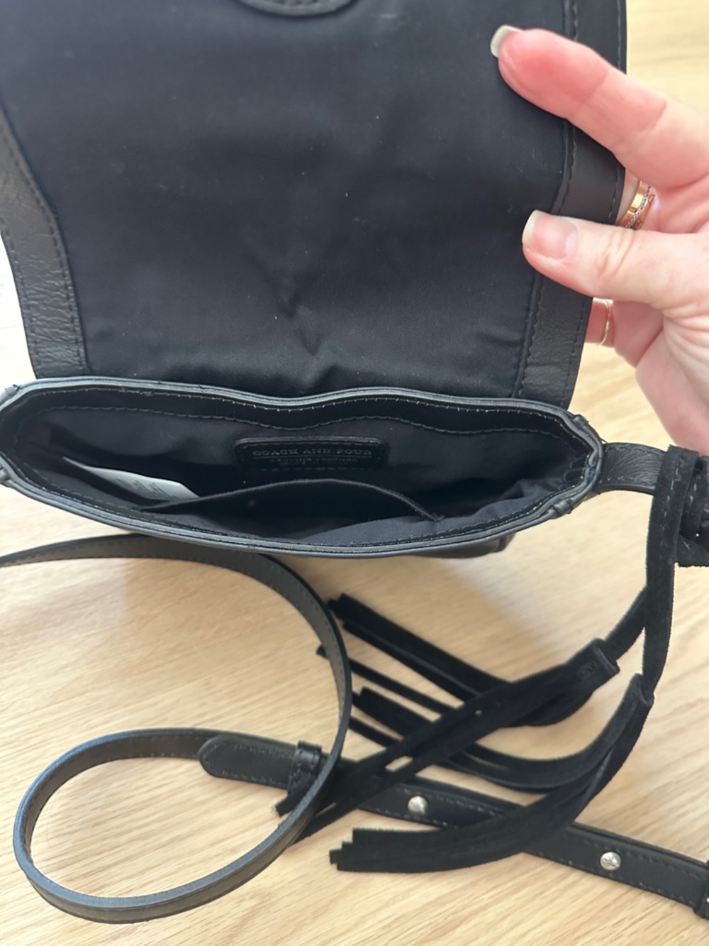 Coach and Four Black Leather Crossbody with Tassel - Picture 7 of 7